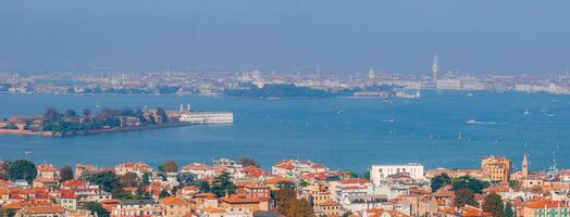 Aerial View of Venice near Saint Mark's Square, Rialto bridge and narrow canals. photo