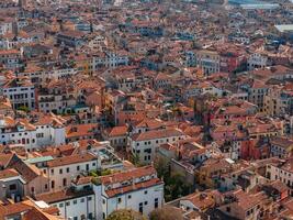 Aerial View of Venice near Saint Mark's Square, Rialto bridge and narrow canals. photo