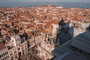 Breathtaking Aerial View of Venice Cityscape with Historic Buildings and Canals photo