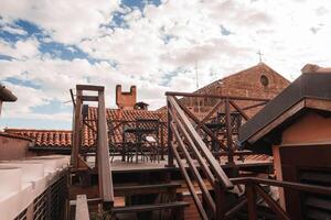 Tranquil and Serene View from Old Building Rooftop in Venice, Italy on a Beautiful Summer Day photo