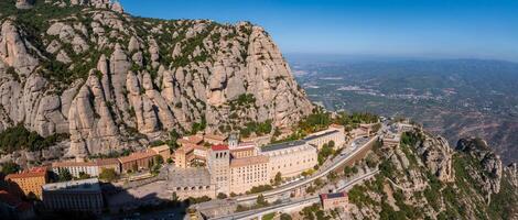 Aerial view of the Benedict church Abbey of Monserrat from Barcelona, Spain. photo