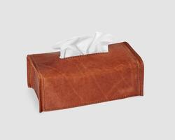 Brown leather tissue box cover decorated with embossed letters photo