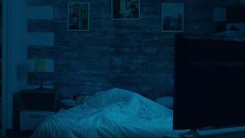 Couple sleeping under the blanket in bedroom with moon light hitting the room video