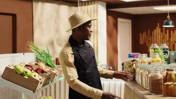 POV of storekeeper presenting his organic products on video, working on new ad commercial to promote local farming nonpolluting business. Merchant talking about ethically sourced items. Camera A. video