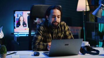 Man in video call session with therapist, asking for advice, feeling down. Remotely working employee in online consultation with psychologist from stylish cozy home, greeting him, camera A