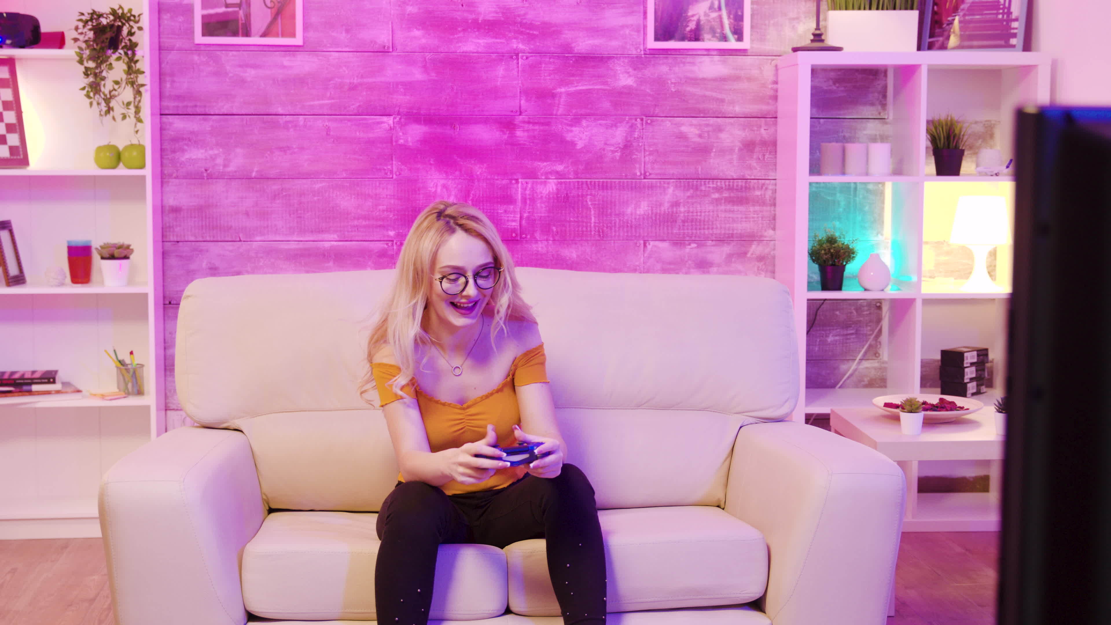 Beautiful Blonde Girl Excited While Playing Video Games Using Wireless Controllers Cheerful 