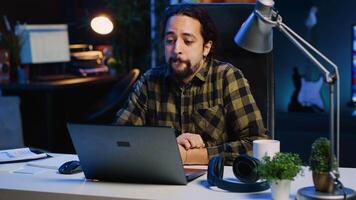 Man checking up on abroad living friend during video conference meeting over the internet. Caucasian person enjoying time together with mate in online video call session while at home, camera A