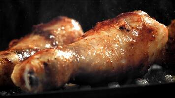 Chicken legs are fried in a pan. Filmed on a high-speed camera at 1000 fps. High quality FullHD footage video