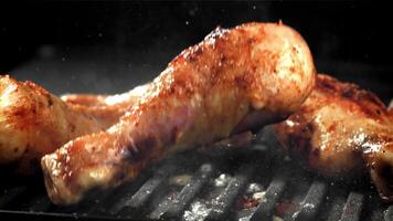 The chicken leg falls into the pan. Filmed on a high-speed camera at 1000 fps. High quality FullHD footage video