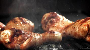 The chicken leg falls into the pan. Filmed on a high-speed camera at 1000 fps. High quality FullHD footage video