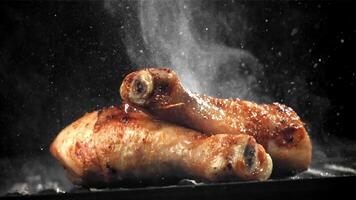 Chicken legs are fried in a pan. Filmed on a high-speed camera at 1000 fps. High quality FullHD footage video