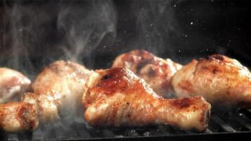 Chicken legs are fried in a pan. Filmed on a high-speed camera at 1000 fps. High quality FullHD footage video