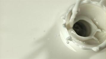 Fresh milk. Top view. Filmed on a high-speed camera at 1000 fps. High quality FullHD footage video