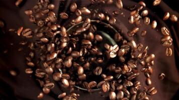 The coffee flies out of the grinder. Filmed on a high-speed camera at 1000 fps. High quality FullHD footage video