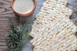 Bowl of tahini with matzos photo