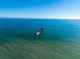 Old tanker ship wreck near the coast of California, USA. photo