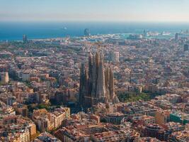 Aerial view of Barcelona City Skyline and Sagrada Familia Cathedral at sunset photo