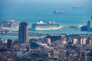 Expansive Panoramic View of Barcelona, Port, and the Mediterranean Sea photo