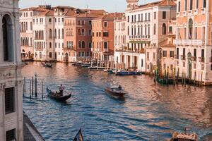 Tranquil Grand Canal View of Traditional Venetian Architecture in Peaceful Venice, Italy photo