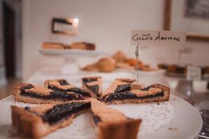 Delicious Pastries and Charming Sign on Table in Venetian Hotel - Summer Collection photo