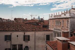 Moody and Atmospheric Scenic View of Venice, Italy from Rooftop on Cloudy Day photo