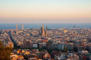 Golden Hour View Panoramic Scene of Sagrada Familia in Barcelona, Spain. photo