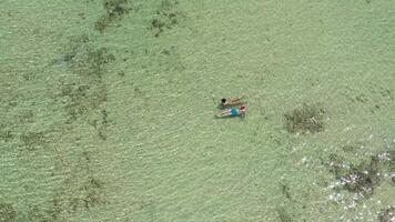 Couple enjoying a tropical beach. video