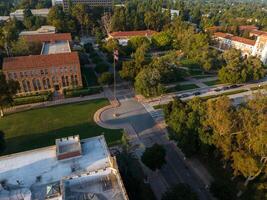 Aerial View of Diverse University Architecture with Red-Brick Buildings and Domed Library photo