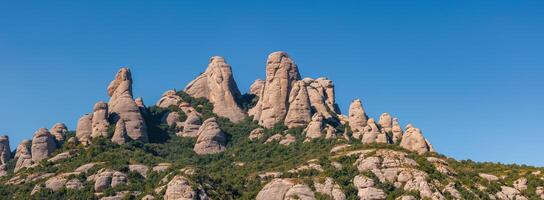 Aerial view of the Benedict church Abbey of Monserrat from Barcelona, Spain. photo