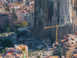 Aerial view of Barcelona City Skyline and Sagrada Familia Cathedral at sunset photo