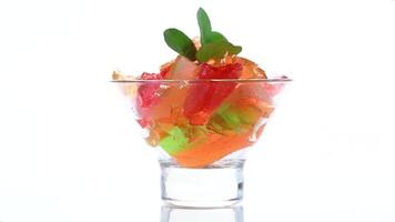 gekleurde zoet fruit gelei in een glas glas video