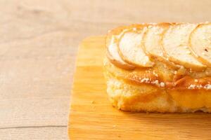 apple loaf crumbled on wood board photo