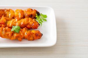 grilled chicken skewer with herbs and spices photo