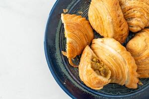 curry puff stuffed chicken on plate photo