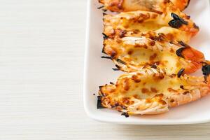 grilled river prawns or shrimps with cheese photo