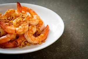 fried shrimps or prawns with garlic photo