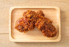 fried chicken with spicy Korean sauce photo