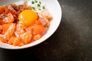 Japanese rice with fresh salmon raw and egg photo