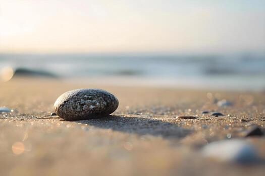 ai generado un rock sentado en parte superior de un arenoso playa foto