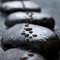 ai generado un fila de rocas con agua gotas en ellos foto