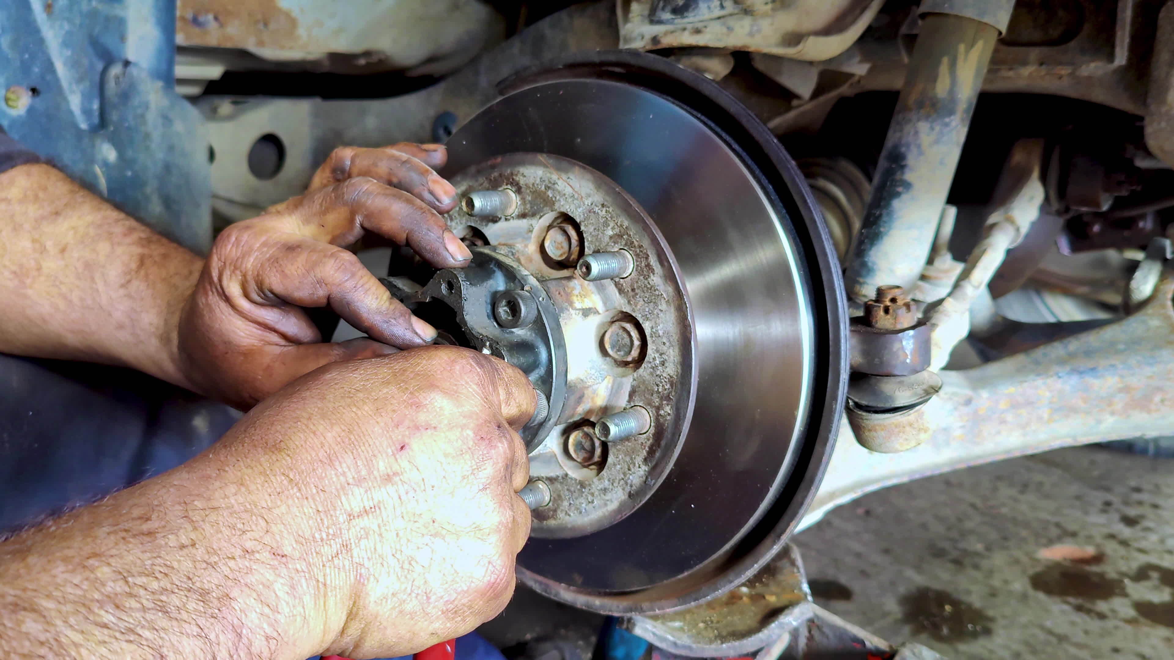 Repair and Replacing Car Front Brake Shoes in the Repair Shop 38926263