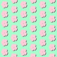 A seamless pattern of Frangipani on a green background in a spring minimal floral concept, Vector