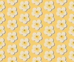 A seamless pattern of apple blossom on a yellow background in a spring minimal floral concept, Vector