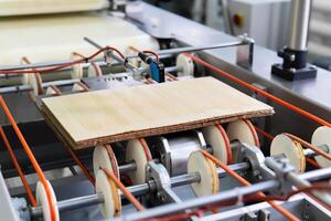 ready-made multi-layer wafer on the conveyor of a confectionery factory photo