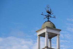 Dartmouth, Devon, UK - January 14. View of a weathervane in Dartmouth, Devon on January 14, 2024 photo