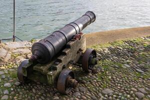 Dartmouth, Devon, UK - January 14. Cannon by the River Dart in Dartmouth, Devon on January 14, 2024 photo