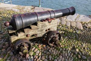 Dartmouth, Devon, UK - January 14. Cannon by the River Dart in Dartmouth, Devon on January 14, 2024 photo