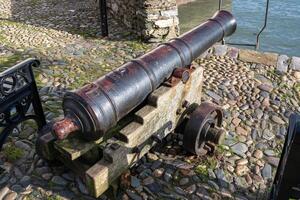 Dartmouth, Devon, UK - January 14. Cannon by the River Dart in Dartmouth, Devon on January 14, 2024 photo