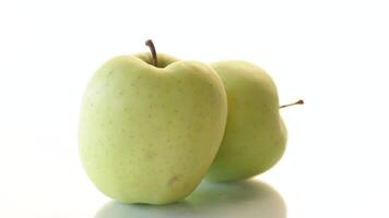 two ripe green apple isolated on white background video