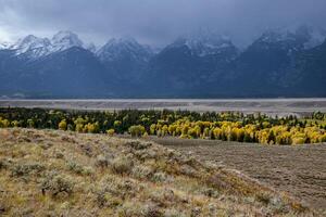 Stormy weather over the Grand Teton mountain range photo